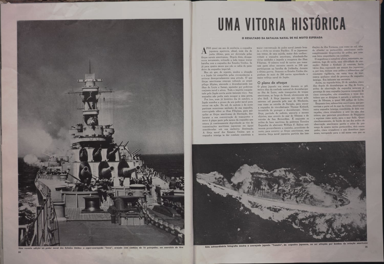 Imagem de navio de guerra americano com detalhes de armamento e estrutura naval.